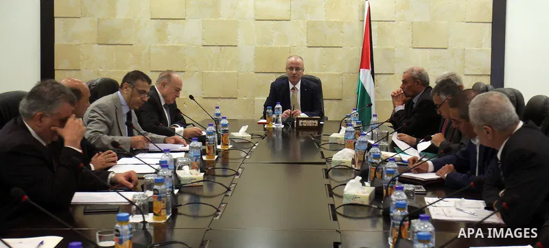 Palestinian Prime Minister Rami Hamdallah, chairs a meeting of the Ministerial Committee, in the West Bank city of Ramallah, on august 31, 2015. Photo by Prime Minister Office