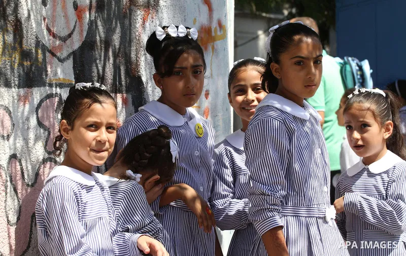 Palestinian students return to UNRWA-run schools, after postponement the school year in Gaza strip due to the reduction of educational programs given by the United Nations Relief and Works Agency (UNRWA) and the growing...