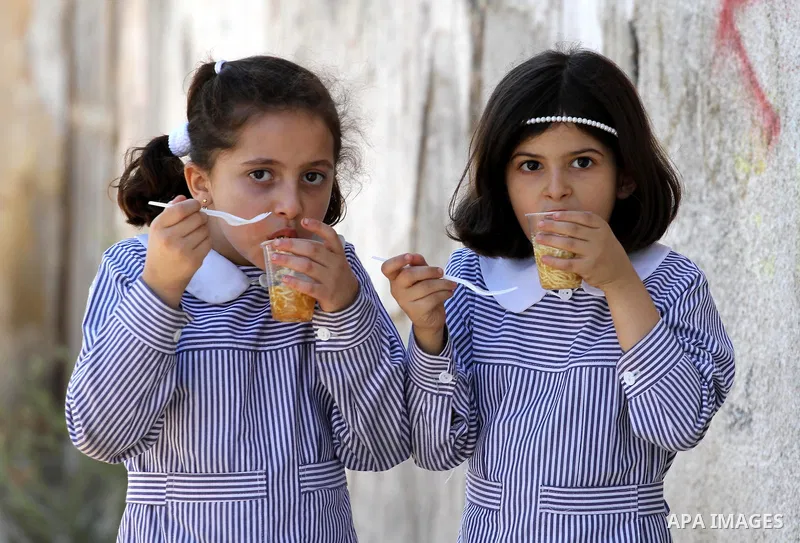 Palestinian students return to UNRWA-run schools, after postponement the school year in Gaza strip due to the reduction of educational programs given by the United Nations Relief and Works Agency (UNRWA) and the growing...
