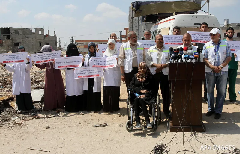 Palestinian manager of El-Wafa hospital, Tayssir El-Beltagy speaks during a press conference in front of the rubbles of El-Wafa hospital, which witnesses said was destroyed during a seven-week Israeli offensive, in the e...