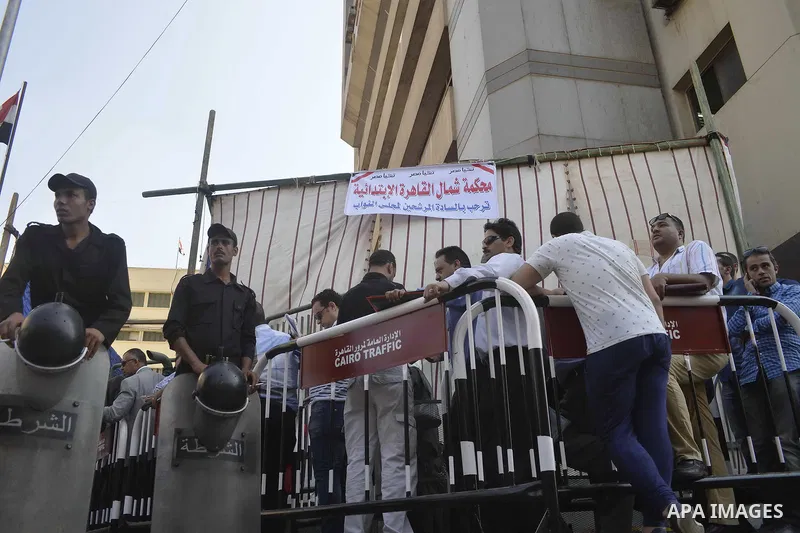 Egyptians wait in line to submit nomination paperwork for potential candidates in parliamentary elections, at a courthouse in Cairo, Sept. 1, 2015. Egypt on Sunday announced that long-awaited parliamentary elections will...