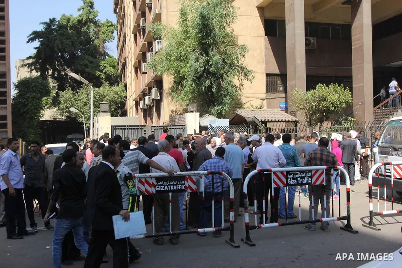 Egyptians wait in line to submit nomination paperwork for potential candidates in parliamentary elections, at a courthouse in Cairo, Sept. 1, 2015. Egypt on Sunday announced that long-awaited parliamentary elections will...