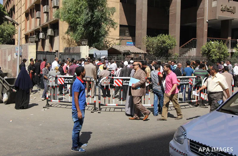 Egyptians wait in line to submit nomination paperwork for potential candidates in parliamentary elections, at a courthouse in Cairo, Sept. 1, 2015. Egypt on Sunday announced that long-awaited parliamentary elections will...