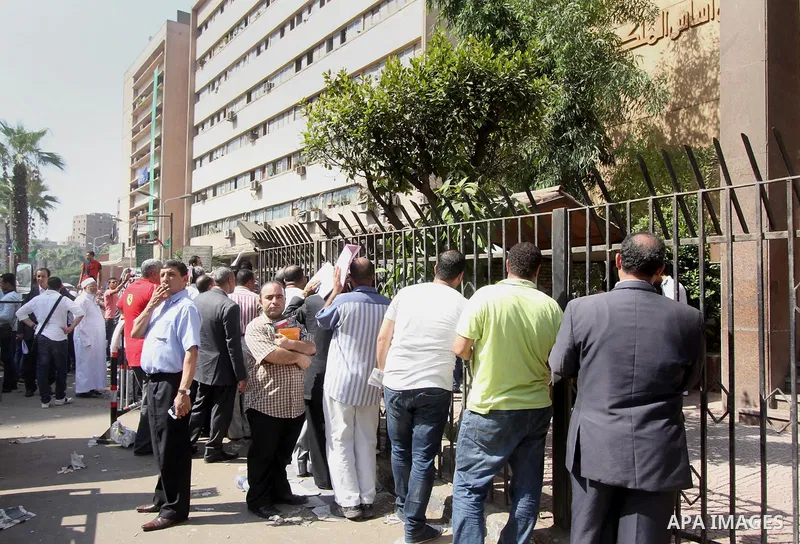Egyptians wait in line to submit nomination paperwork for potential candidates in parliamentary elections, at a courthouse in Cairo, Sept. 1, 2015. Egypt on Sunday announced that long-awaited parliamentary elections will...