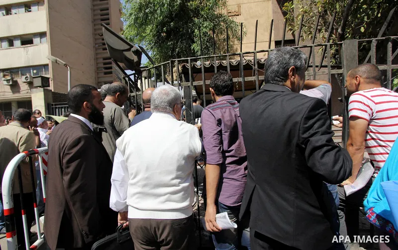 Egyptians wait in line to submit nomination paperwork for potential candidates in parliamentary elections, at a courthouse in Cairo, Sept. 1, 2015. Egypt on Sunday announced that long-awaited parliamentary elections will...