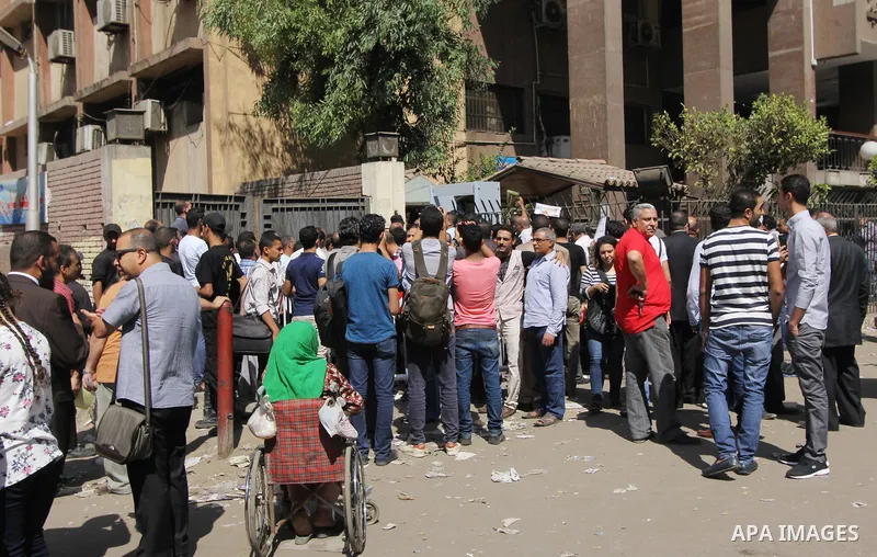 Egyptians wait in line to submit nomination paperwork for potential candidates in parliamentary elections, at a courthouse in Cairo, Sept. 1, 2015. Egypt on Sunday announced that long-awaited parliamentary elections will...
