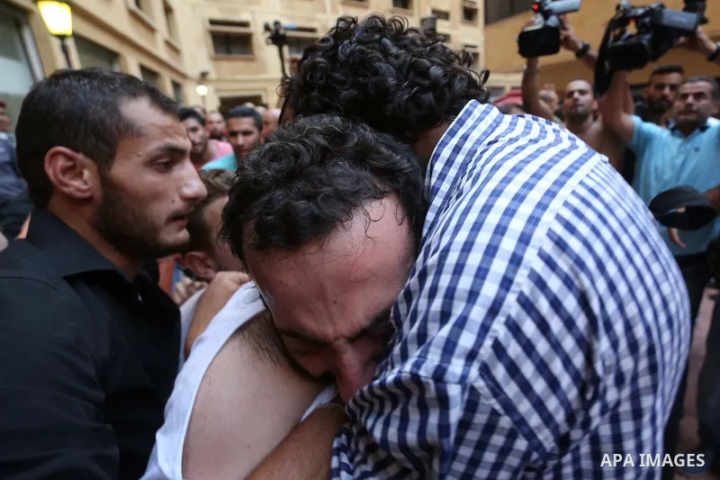 Lebanese activist Lucien Abou Rjeily is carried by fellow demonstrators after activists claim he was beaten by Lebanese police as they started forcefully evacuating protesters who occupied part of the environment ministr...