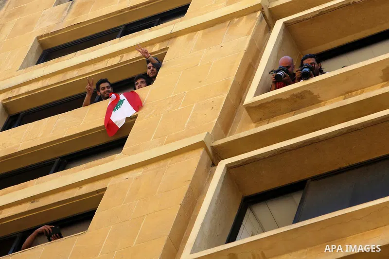 Lebanese activist clash with riot police outside the environment ministry in downtown Beirut on September 1, 2015 as Lebanese police started forcefully evacuating protesters who had occupied part of the building in a sur...