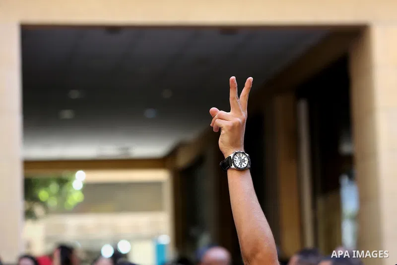 Lebanese activist clash with riot police outside the environment ministry in downtown Beirut on September 1, 2015 as Lebanese police started forcefully evacuating protesters who had occupied part of the building in a sur...