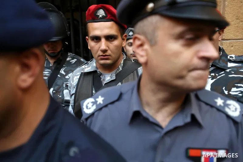 Lebanese activist clash with riot police outside the environment ministry in downtown Beirut on September 1, 2015 as Lebanese police started forcefully evacuating protesters who had occupied part of the building in a sur...