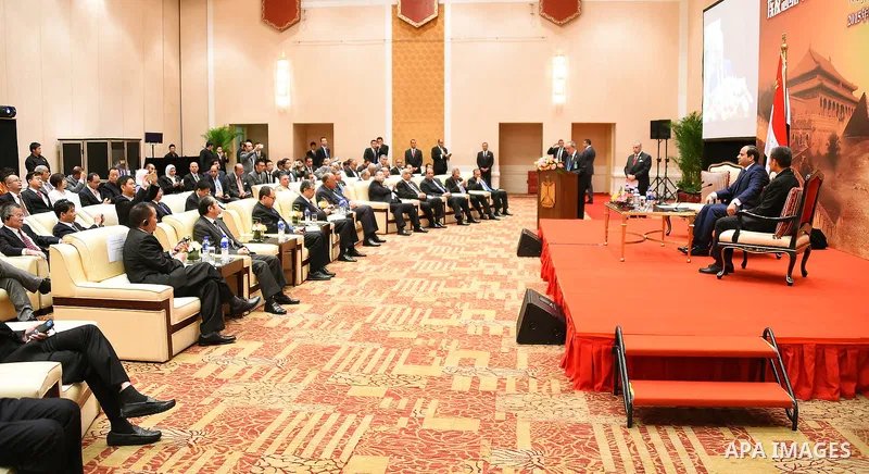 Egyptian President Abdel-Fattah al-Sisi meets with Chinese businessmen in Beijing, capital of China, Sept. 2, 2015, to attend events commemorating the 70th anniversary of the victory in the Chinese People's War of Resist...