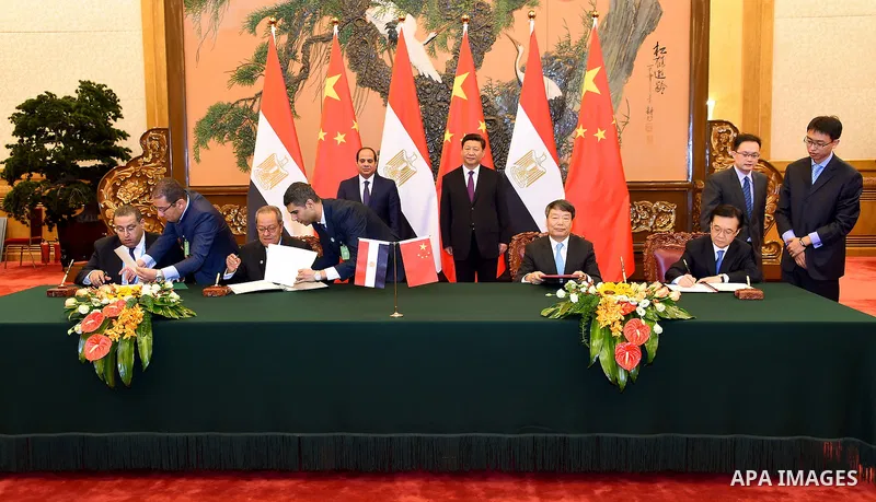 Egyptian President Abdel-Fattah al-Sisi meets with Chinese businessmen in Beijing, capital of China, Sept. 2, 2015, to attend events commemorating the 70th anniversary of the victory in the Chinese People's War of Resist...