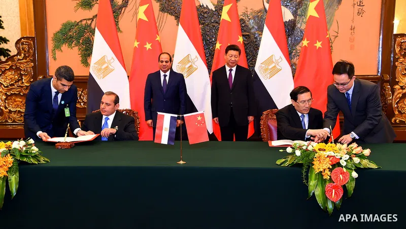 Egyptian President Abdel-Fattah al-Sisi meets with Chinese businessmen in Beijing, capital of China, Sept. 2, 2015, to attend events commemorating the 70th anniversary of the victory in the Chinese People's War of Resist...
