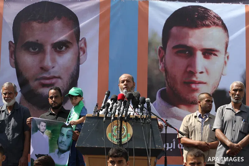 Families of Palestinians who were abducted of by gunmen is Egypt's Sinai's northern region, take part in a demonstration calling for their release outside the Egyptian embassy in Gaza city, on Sep. 4, 2015. Gunmen in Egy...