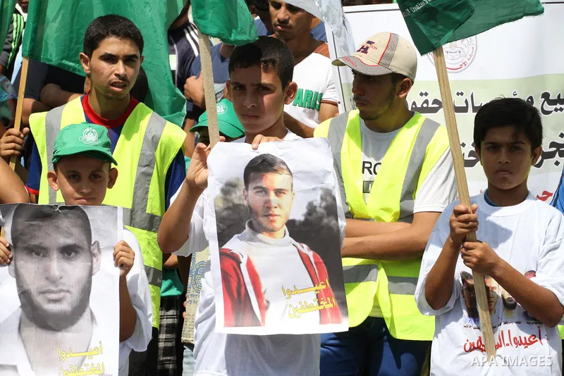 Families of Palestinians who were abducted of by gunmen is Egypt's Sinai's northern region, take part in a demonstration calling for their release outside the Egyptian embassy in Gaza city, on Sep. 4, 2015. Gunmen in Egy...