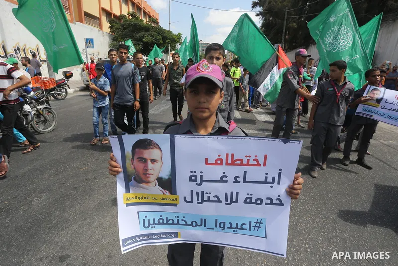 Families of Palestinians who were abducted of by gunmen is Egypt's Sinai's northern region, take part in a demonstration calling for their release outside the Egyptian embassy in Gaza city, on Sep. 4, 2015. Gunmen in Egy...