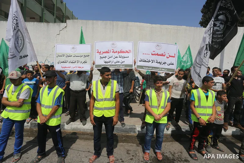Families of Palestinians who were abducted of by gunmen is Egypt's Sinai's northern region, take part in a demonstration calling for their release outside the Egyptian embassy in Gaza city, on Sep. 4, 2015. Gunmen in Egy...