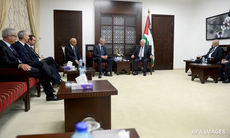 Palestinian President Mahmoud Abbas meets with deputy in the French parliament, Bruno Lemaire, in the West Bank city of Ramallah, Sep. 5, 2015. Photo by Osama Falah