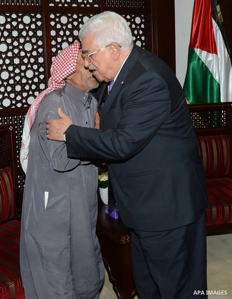 Palestinian President Mahmoud Abbas meets with family of 18-month-old Palestinian Ali Saad Dawabsheh, the toddler who was burned to death by suspected Jewish extremists, in the West Bank city of Ramallah, Sep. 5, 2015. P...