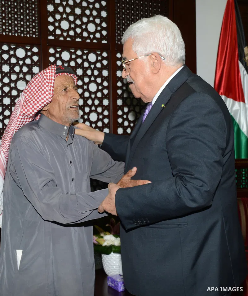 Palestinian President Mahmoud Abbas meets with family of 18-month-old Palestinian Ali Saad Dawabsheh, the toddler who was burned to death by suspected Jewish extremists, in the West Bank city of Ramallah, Sep. 5, 2015. P...
