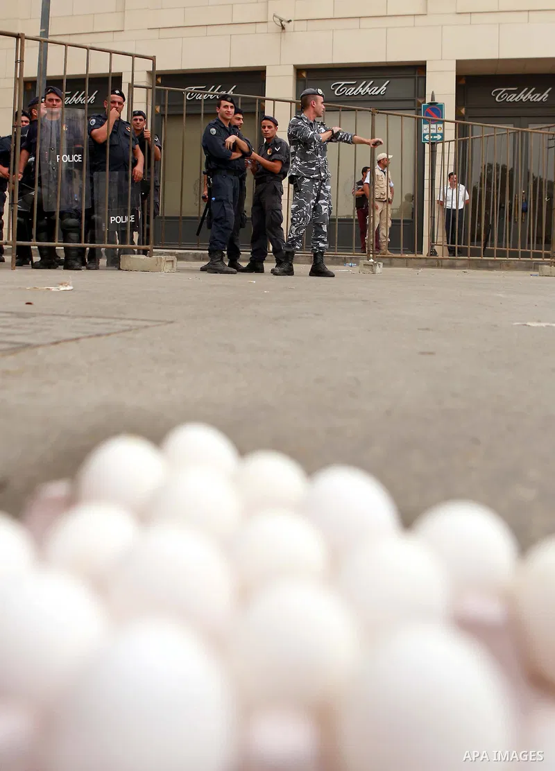 Lebanese policemen stand guard during a protest denouncing Lebanon's stagnant political system, that has become the target of demonstrations following a trash crisis, in Beirut's Martyr's square, on September 9, 2015. Le...