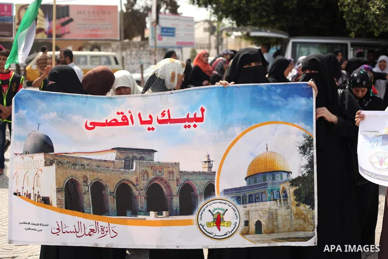 Palestinian supporters of the Islamic Jihad take part in a protest following clashes between Palestinians and Israeli police at Jerusalem's flashpoint Al-Aqsa mosque compound, in Gaza city on September 14, 2015. Muslims...