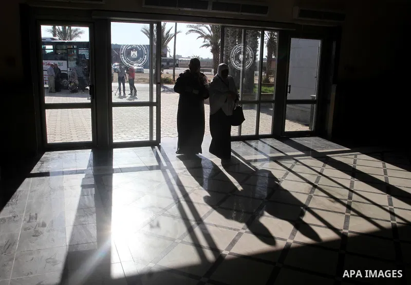 Families of Palestinian martyrs wait at the Rafah border crossing between Egypt and the southern Gaza Strip, on September 17, 2015, as they head to the annual hajj pilgrimage in Saudi Arabia's holy city of Mecca. Custodi...