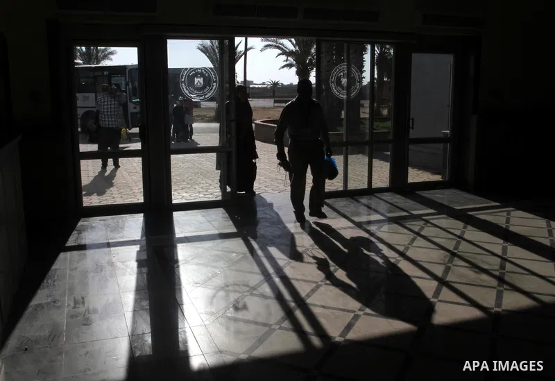 Families of Palestinian martyrs wait at the Rafah border crossing between Egypt and the southern Gaza Strip, on September 17, 2015, as they head to the annual hajj pilgrimage in Saudi Arabia's holy city of Mecca. Custodi...