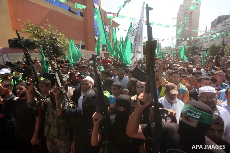 Palestinian Hamas militants take part in a protest against the Israeli police raid on Jerusalem's al-Aqsa mosque on Tuesday, in Khan Younis in the southern Gaza Strip, September 18, 2015. Israel deployed hundreds of extr...