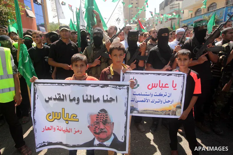 Palestinian Hamas supporters take part in a protest against the Israeli police raid on Jerusalem's al-Aqsa mosque on Tuesday, in Khan Younis in the southern Gaza Strip, September 18, 2015. Israel deployed hundreds of ext...