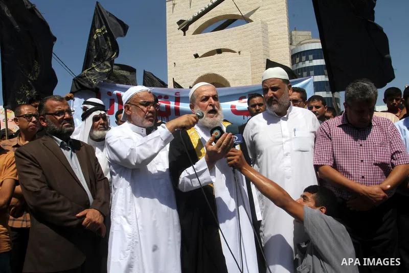 Palestinian Islamic Jihad supporters take part in a protest against the Israeli police raid on Jerusalem's al-Aqsa mosque on Tuesday, in Rafah in the southern Gaza Strip, September 18, 2015. Israel deployed hundreds of e...