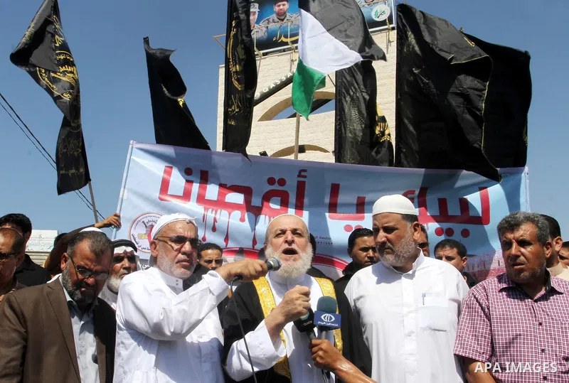 Palestinian Islamic Jihad supporters take part in a protest against the Israeli police raid on Jerusalem's al-Aqsa mosque on Tuesday, in Rafah in the southern Gaza Strip, September 18, 2015. Israel deployed hundreds of e...