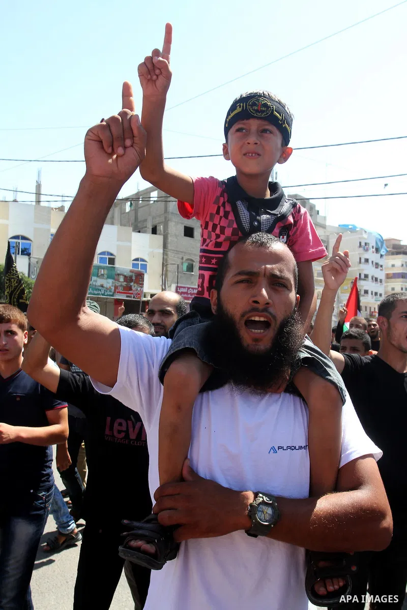 Palestinian Islamic Jihad supporters take part in a protest against the Israeli police raid on Jerusalem's al-Aqsa mosque on Tuesday, in Rafah in the southern Gaza Strip, September 18, 2015. Israel deployed hundreds of e...