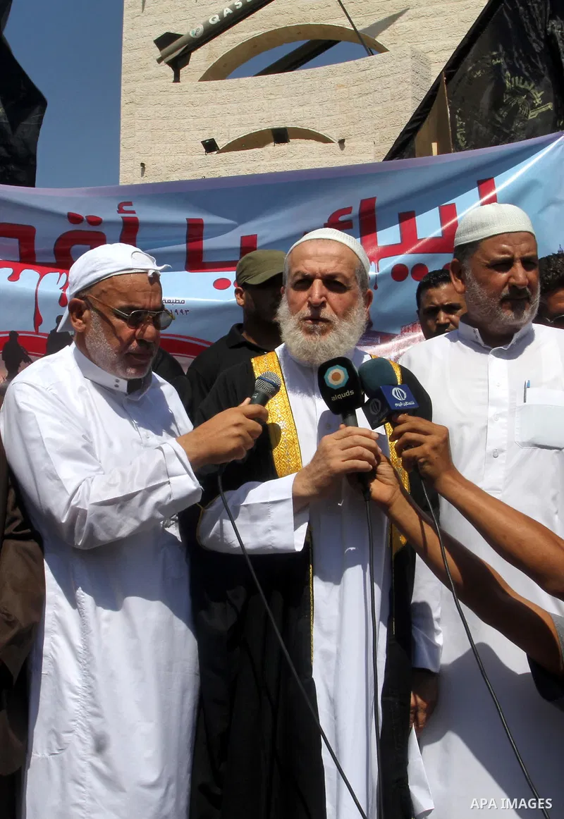 Palestinian Islamic Jihad supporters take part in a protest against the Israeli police raid on Jerusalem's al-Aqsa mosque on Tuesday, in Rafah in the southern Gaza Strip, September 18, 2015. Israel deployed hundreds of e...