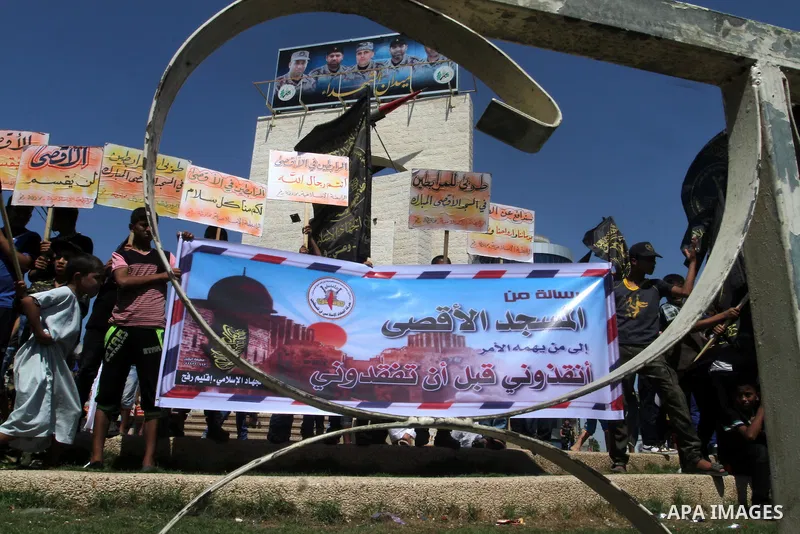 Palestinian Islamic Jihad supporters take part in a protest against the Israeli police raid on Jerusalem's al-Aqsa mosque on Tuesday, in Rafah in the southern Gaza Strip, September 18, 2015. Israel deployed hundreds of e...