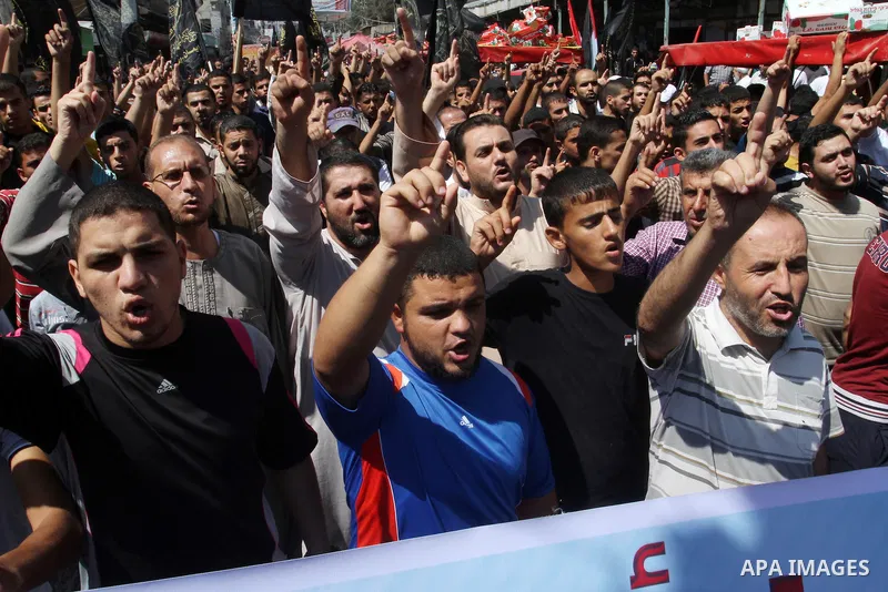Palestinian Islamic Jihad supporters take part in a protest against the Israeli police raid on Jerusalem's al-Aqsa mosque on Tuesday, in Rafah in the southern Gaza Strip, September 18, 2015. Israel deployed hundreds of e...