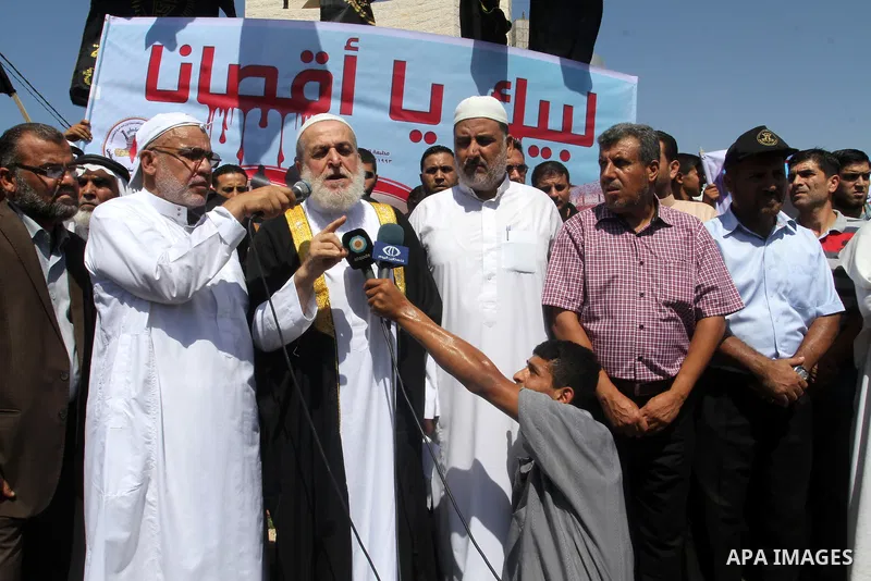 Palestinian Islamic Jihad supporters take part in a protest against the Israeli police raid on Jerusalem's al-Aqsa mosque on Tuesday, in Rafah in the southern Gaza Strip, September 18, 2015. Israel deployed hundreds of e...