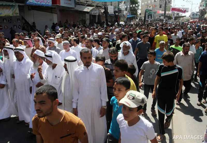 Palestinian Islamic Jihad supporters take part in a protest against the Israeli police raid on Jerusalem's al-Aqsa mosque on Tuesday, in Rafah in the southern Gaza Strip, September 18, 2015. Israel deployed hundreds of e...