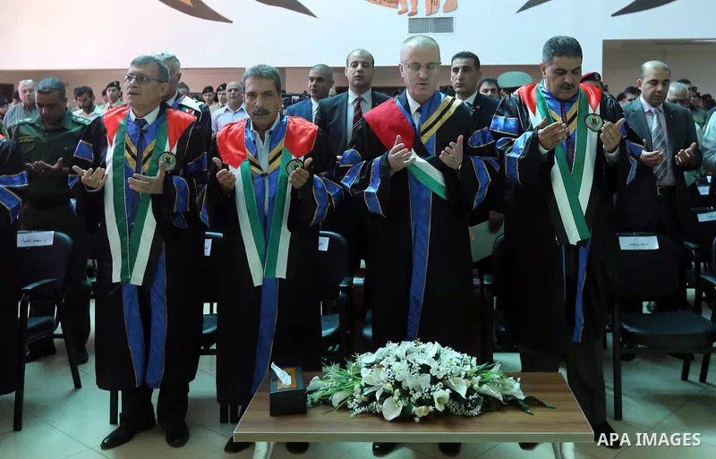 Palestinian Prime Minister, Rami Hamdallah, attends a graduation ceremony at Al-istiqlal University in the West bank city of Ramallah, on Sept. 19, 2015. Photo by Prime Minister Office