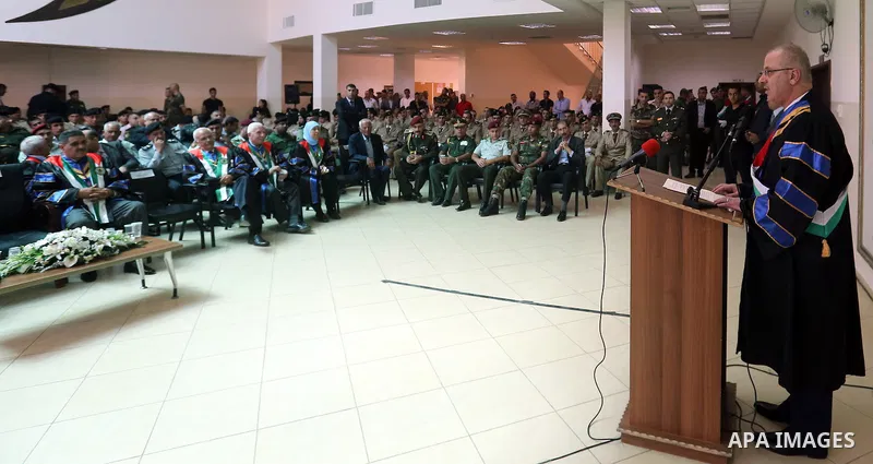 Palestinian Prime Minister, Rami Hamdallah, attends a graduation ceremony at Al-istiqlal University in the West bank city of Ramallah, on Sept. 19, 2015. Photo by Prime Minister Office