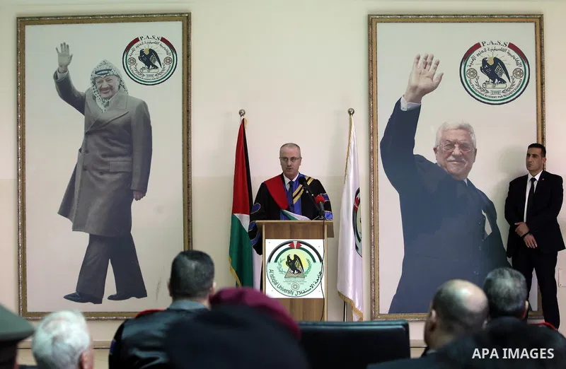 Palestinian Prime Minister, Rami Hamdallah, attends a graduation ceremony at Al-istiqlal University in the West bank city of Ramallah, on Sept. 19, 2015. Photo by Prime Minister Office
