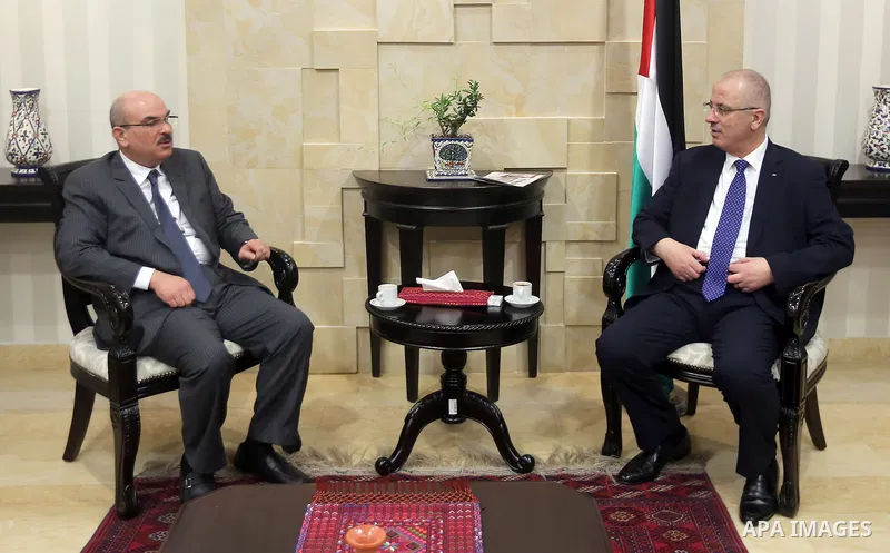 Palestinian Prime Minister, Rami Hamdallah, meets with Qatari ambassador Mohammed al-Emadi in the West bank city of Ramallah, on Sept. 19, 2015. Photo by Prime Minister Office