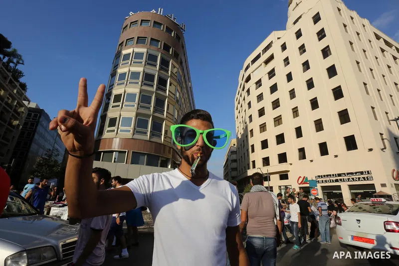Lebanese participate in a popular market "Abu Rakhosa market" during the campaign "we want to accountable" against the head of the Beirut Traders Association Nicolas Shammas, in Riad al-Solh square in front of the Grand...