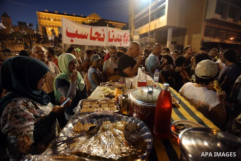 Lebanese participate in a popular market "Abu Rakhosa market" during the campaign "we want to accountable" against the head of the Beirut Traders Association Nicolas Shammas, in Riad al-Solh square in front of the Grand...