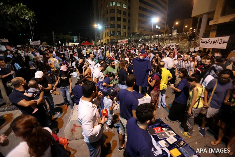 Lebanese participate in a popular market "Abu Rakhosa market" during the campaign "we want to accountable" against the head of the Beirut Traders Association Nicolas Shammas, in Riad al-Solh square in front of the Grand...