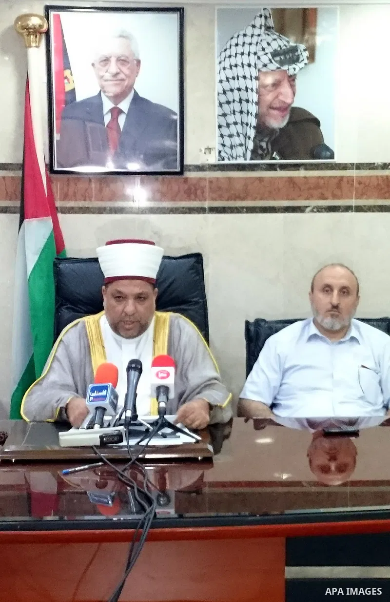 Palestinian Minister of Religious Affairs Yousef Adeis, speaks during a press conference in Mecca on September 15, 2015. According to the Muslims holy book the Koran, the Kaaba was built by Abraham and his son Ismael, af...