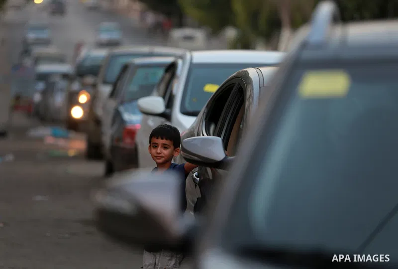 Palestinian drivers wait in line to fill their cars in front of a filling station in Gaza City, on September 21, 2015. Due to severe fuel shortages, the Gaza power plant has been operating at approximately half of its ca...