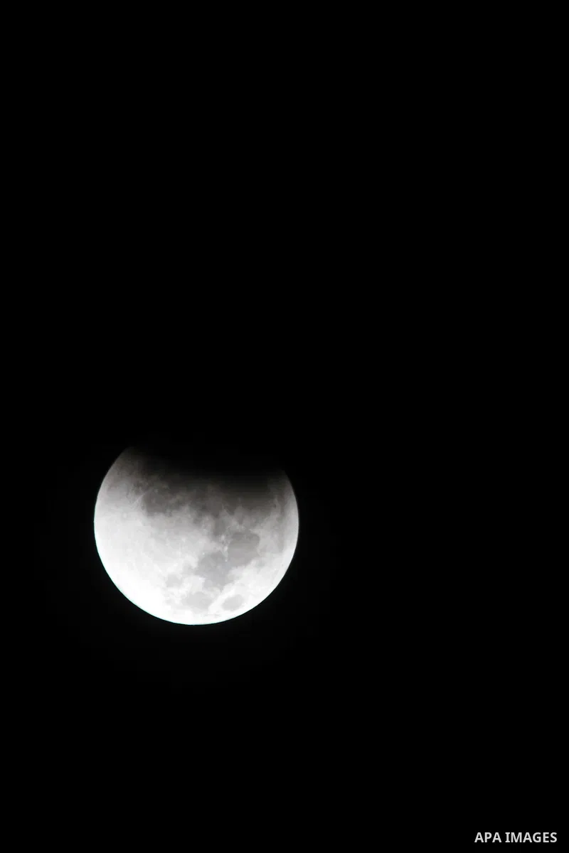 A supermoon is pictured at the beginning of a total lunar eclipse above Rafah in southern Gaza strip, September 28, 2015. Sky-watchers around the world are in for a treat Sunday night and Monday when the shadow of Earth...