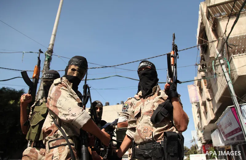 Palestinian militants of the Nasser Salah al-Din Brigades the military wing of the Popular Resistance Committees take part in a press conference, in Gaza City on Sept. 29, 2015. Photo by Ashraf Amra