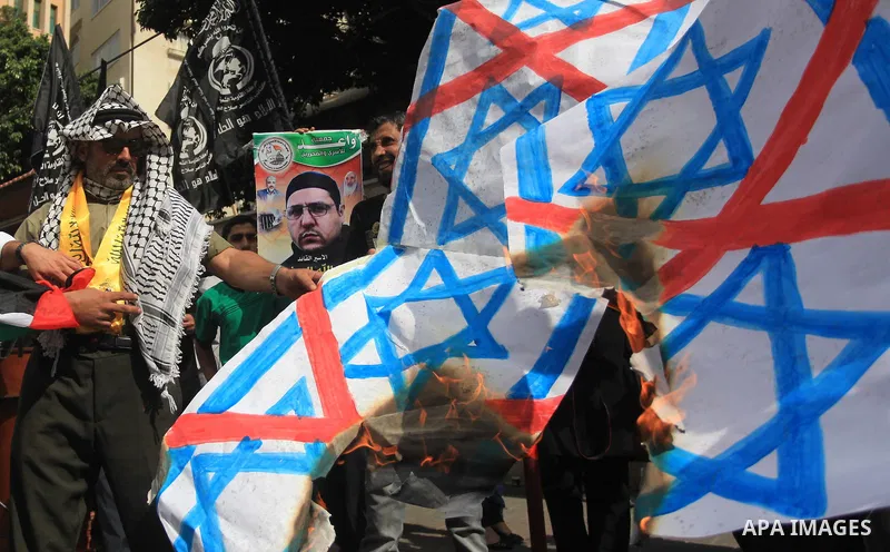 Relatives of Palestinian prisoners in Israeli jails, take part in a protest to show solidarity with Palestinians clashing with Israeli security forces at Jerusalem's al-Aqsa mosque, outside the Red Cross office, in Gaza...
